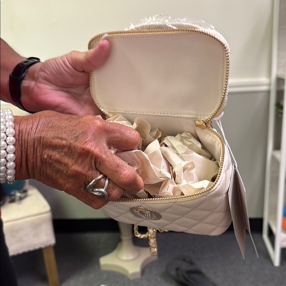 Valentino Orlandi Cream and Gold Mini Bag with Quilted Design
$99.00 TODAY ONLY - Picture 3 of 14